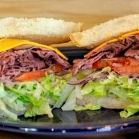 Trestles Sandwich · Roast beef, sharp Cheddar, shredded lettuce, tomatoes, shaved red onions, mayo and yellow mu...