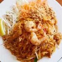 Pad Thai · Thin rice stick noodles, egg, green onions, bean sprouts in a sweet and tangy tamarind sauce...