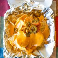 Nachos With Cheese · Chips, cheese and jalapeños.