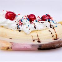Banana Split · Choice of  three flavors of ice cream, whipped cream, cherry, chocolate syrup, sprinkles,.