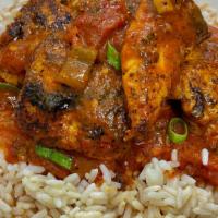 Chicken Creole · Chicken Tenders simmered in a spicy red creole sauce on a bed of rice