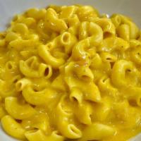 Mac N Cheese · Elbow Macaroni in a rich cheese sauce.