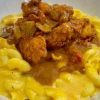 Chicken Étouffée Mac · Topping portions are the same on all sizes. Chicken tender chunks in creole brown sauce