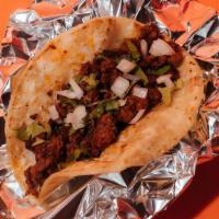 Chorizo Taco · Warm corn tortilla, crispy flavorful chorizo, onion, cilantro and your choice of salsa