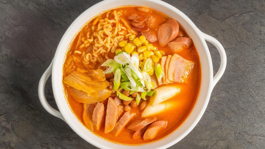 Army Base Stew · Chicken and beef broth based stew with bean, franks, Korean black pig sausage, Spam, onion, pork & beans, corn, kimchi and ramen noodle.
Served with rice.
**Mild Spicy