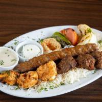 Istanbul'S Combo Kebab Plate · Combination of skewered cubes of marinated chicken tenders, cubes of marinated filet mignon,...