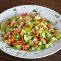 Choban Salad · Anatolian shepherd's salad of tomato, parsley, cucumber, green bell peppers, and onion toppe...