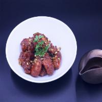 F.C Korean Fried Chicken · 12 Pieces Korean Spiced Fried Chicken Wings, Gochujang Glaze, Pistachio Crumble.