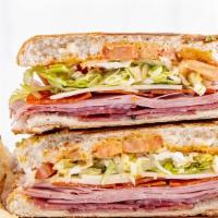 Cold Cut Panini · Truffle mortadella, salami, pepperoni, homemade thousand island sauce, topped with fresh tom...