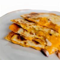 Kids Quesadilla. · Cheesy Deliciousness 🧀, but kid's size! Served with Avocado, Flavor Choice & a small Agua F...