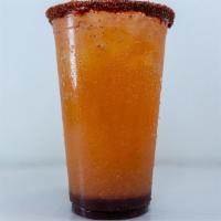Chamango. · Our most popular! Pineapple Mango Agua Fresca, Chamoy, Lime, Tajin + Beer of your choice.