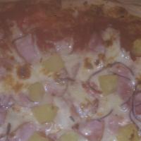 Hawaiian Pizza · Tomato sauce, cheese, pineapple and Canadian bacon.