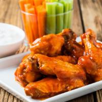 Ranch Wings · Fresh batch of crispy chicken wings smothered in a creamy ranch sauce.