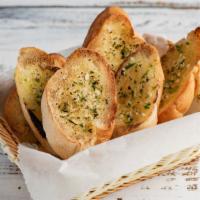 Garlic Bread · Deliciously prepared fresh and buttery bread that is topped with garlic.