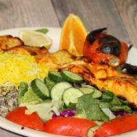 Fresh Fish Kabob (Salmon) · Daily fresh fish marinated and broiled with a skewer of a whole tomato and seasonal vegetabl...