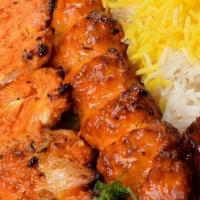 Chicken Shamshiri · Served with grilled vegetables and broiled tomatoes and served with our special basmati rice...