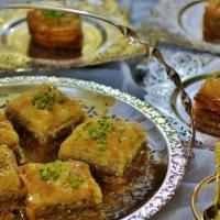 Baghlava · Crushed walnuts, almonds, and pistachios, with honey, a Persian favorite.