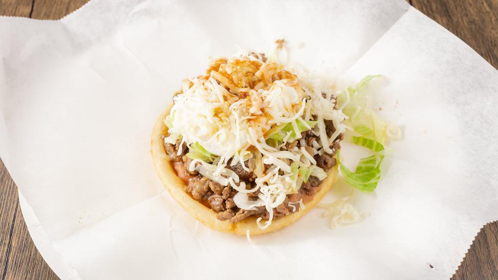 Sopes · Choice of one meat each. Beans, lettuce, sour cream, cheese, and salsa.