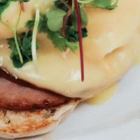Classic Benedict · English muffin, Canadian bacon, poached eggs, and hollandaise sauce.