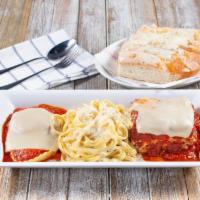 Carolina'S Trio · Our homemade beef lasagna, cheese ravioli, and fettuccini alfredo all on one platter.