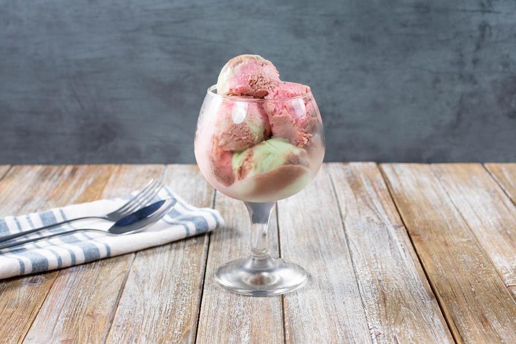Spumoni Ice Cream · A blend of chocolate ice cream, pistachio ice cream, and cherry ice cream. Note: Contains Nuts.