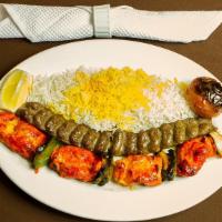 Chicken Shish Kabob And Koobidehs · Chicken breast marinated in our special sauce with bell peppers and onions, with one juicy s...