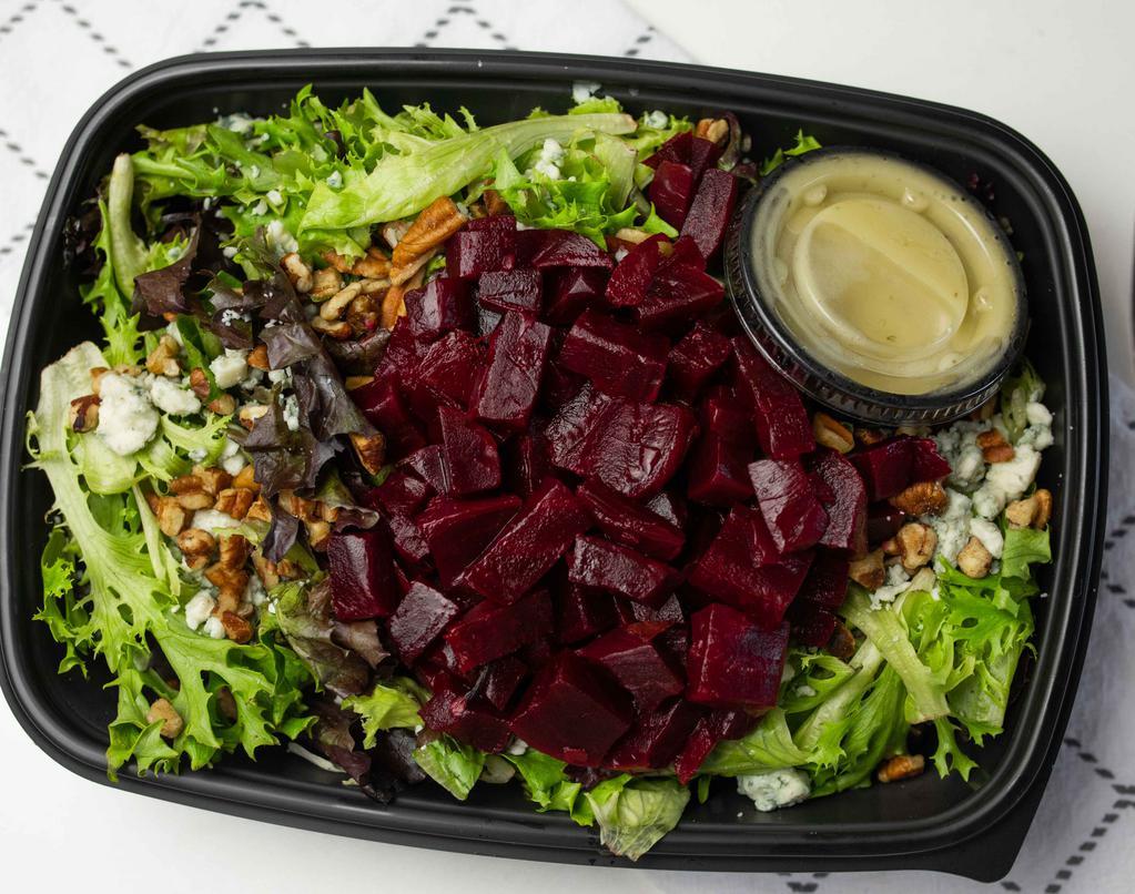Beet Salad · Oven Roasted beets with pecans & bleu cheese crumbles served over mixed greens with balsamic vinagraitte.
