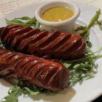 Hot Links · Spicy Beef Links Served With Our Homemade Pickle.