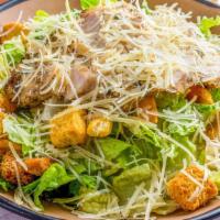 Caesar Salad · Crispy romaine, Parmesan cheese, and croutons tossed with a creamy Caesar dressing. Add Chic...