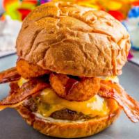 Bbq Bacon Burger · Half pound. Beef patty, cheese, mayonnaise, and BBQ sauce. Topped with bacon and onion rings...