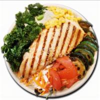 Nori Salmon Bowl · Brown Rice, Salad, Sautéed Zucchini, Salmon, Kale, Corn, Pickled Carrot & Radish, Tomato, Ed...