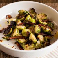 Brussels Sprouts. · Roasted with a balsamic reduction & crispy bacon