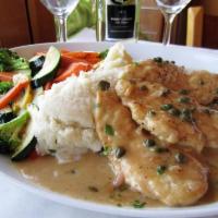 Chicken Piccata · Lemon, butter, capers, shallots, and chardonnay sauce, served with garlic mashed potatoes an...