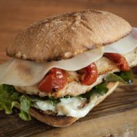 Grilled Chicken Panini · Grilled chicken, leaf lettuce, roasted tomatoes, provolone, aioli