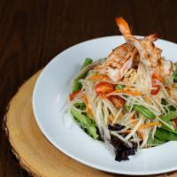Papaya Salad · Spicy. The traditional Thai salad flavored with spicy lime juice dressing, healthy shredded ...