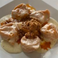Balanzoni Pasticciati · Tomato and Egg Balanzoni (Tortelloni) in cream of parmigiano and meat ragu`