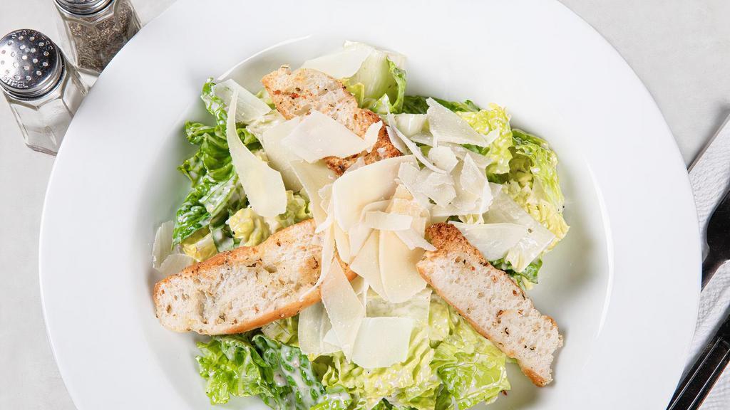 Caesar Salad · Chopped romaine, house-made croutons, shredded parmesan, homemade caesar dressing.