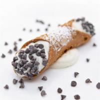 Cannoli  · Italian pastry shell filled with sweet ricotta filling and dipped in chocolate chips.