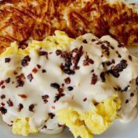 Chicken & Biscuits · Fried chicken, bacon, scrambled eggs and country sausage gravy on biscuits served with hash ...