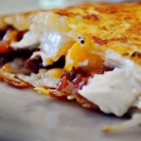 Stuffed Hash Browns · With Bacon, Cheddar & Sour Cream

Consuming raw or undercooked meats, poultry, seafood, shel...