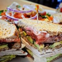 California Club · Triple decker with turkey, bacon, avocado, lettuce, tomatoes, and mayo on toasted wheat.