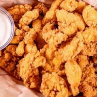 Popcorn Chicken · Flavorful marinated bite-sized chicken, perfectly fried and crisp.  Served with ranch.
