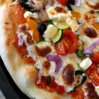 Pizza Veggie Garden · Marinara sauce, mozzarella cheese, spinach, tomatoes, onions & roasted red peppers.