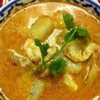Yellow Curry · Mild yellow curry sauce, potatoes, onions and spices, with your choice of chicken, beef or p...