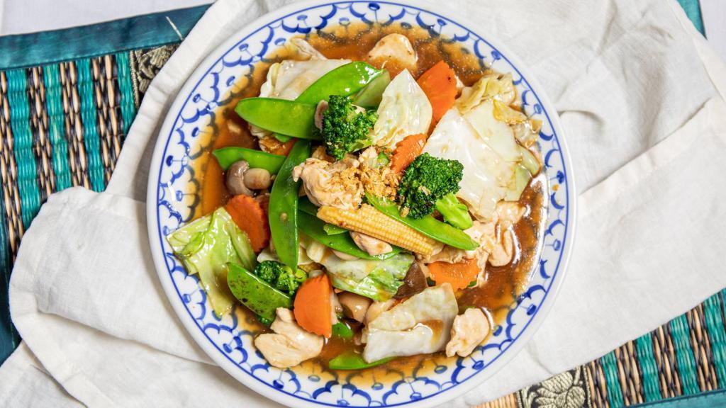 Pud Pug (Mixed Vegetables) · Sliced chicken, beef or pork sauteed with fresh mixed vegetables, soy sauce and Thai herbs.