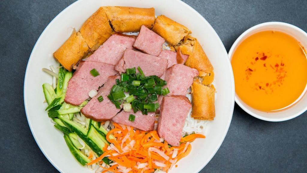 Charbroiled Vietnamese Pork Sausage, Egg Rolls Vermicelli · Rice-vermicelli noodle bowl topped with fresh herbs, vegetables, and served with house special fish sauce.