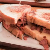 Pastrami Melt · Hot pastrami, melted swiss, Russian dressing, on a grilled sourdough.