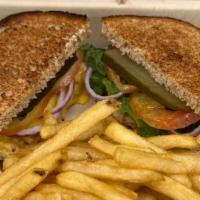 Blt With Chips And Drink · Crispy bacon on grilled whole wheat with lettuce tomatoes and   $1.00  extra for cheese $1.0...