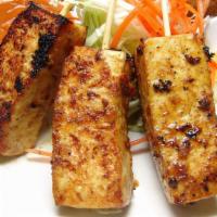 Satay (5 Sticks) · Chicken or tofu served with peanut sauce and cucumber sauce.
