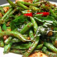 Prik King · Spicy. Sautéed green beans in spicy chili paste.
